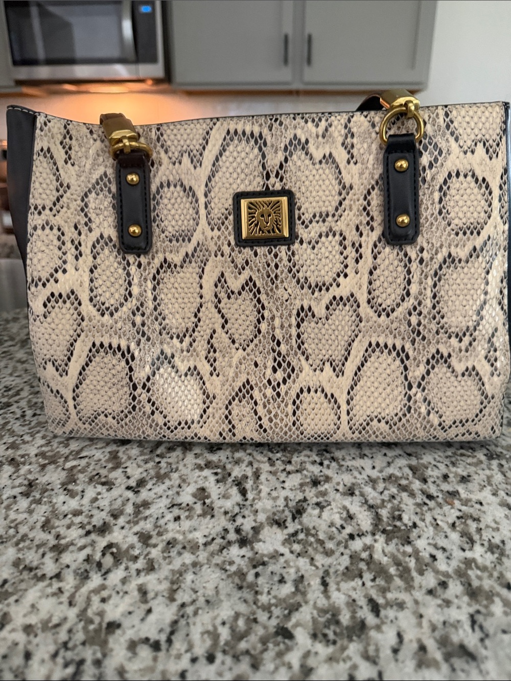 Anne Klein Snake-Embossed Tote in Black and Cream with Gold Hardware